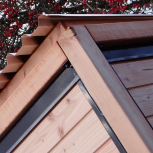 Douglas fir with black-coated steel and aluminium roof.